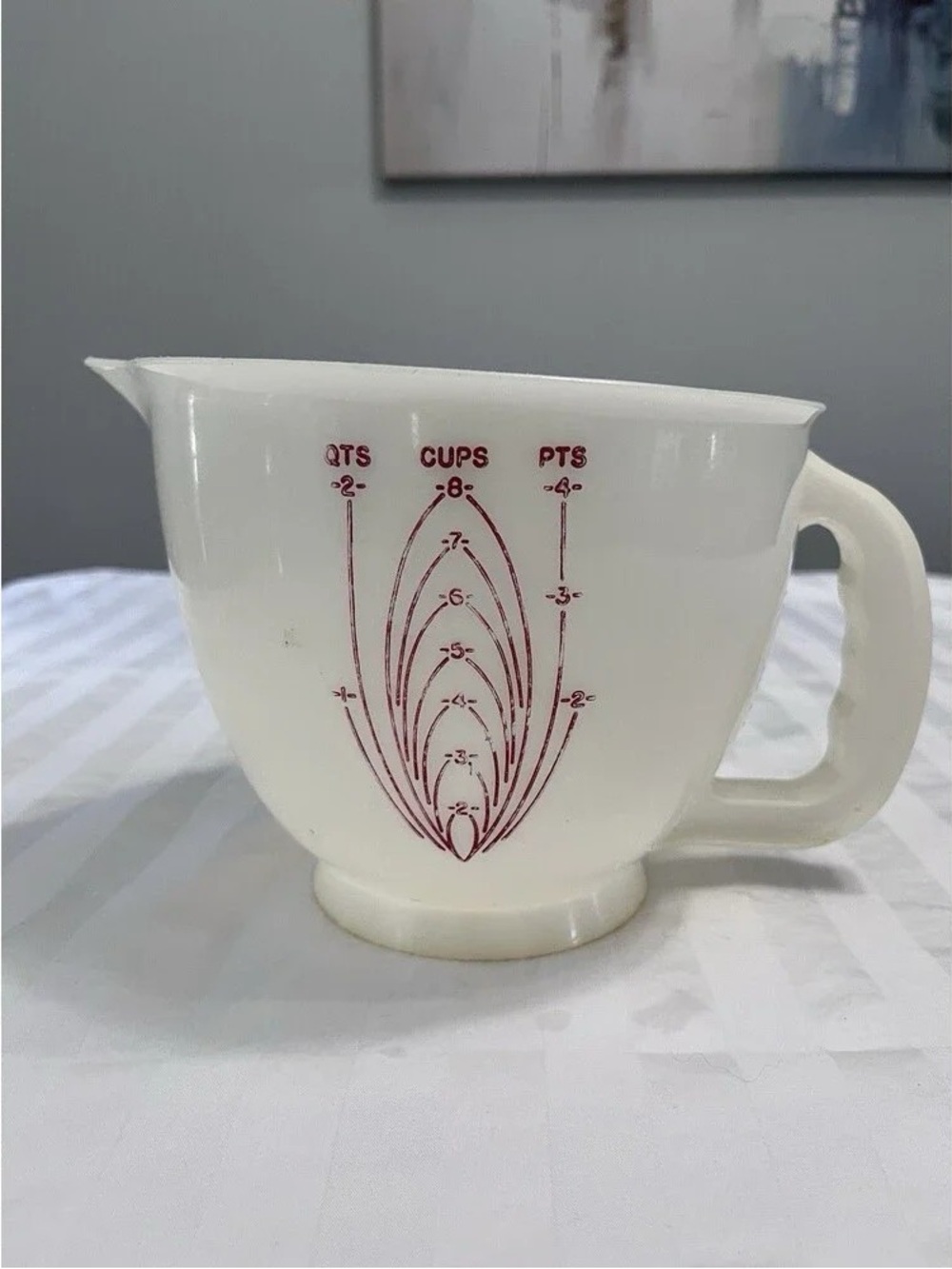 White Glass Measuring Pitcher with Red Measurement Markings